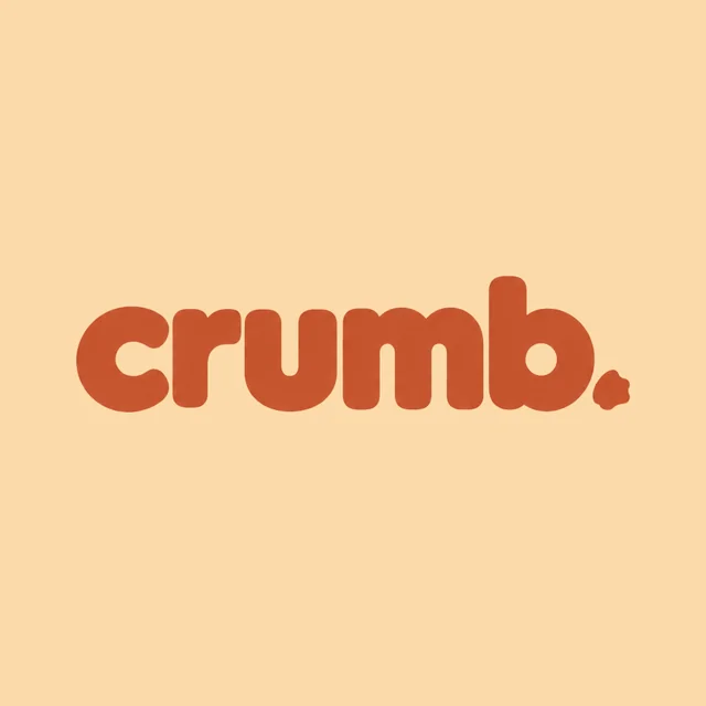 Crumb bakery logo: lowercase 'crumb.' wordmark in terracotta, with the period drawn as a breadcrumb